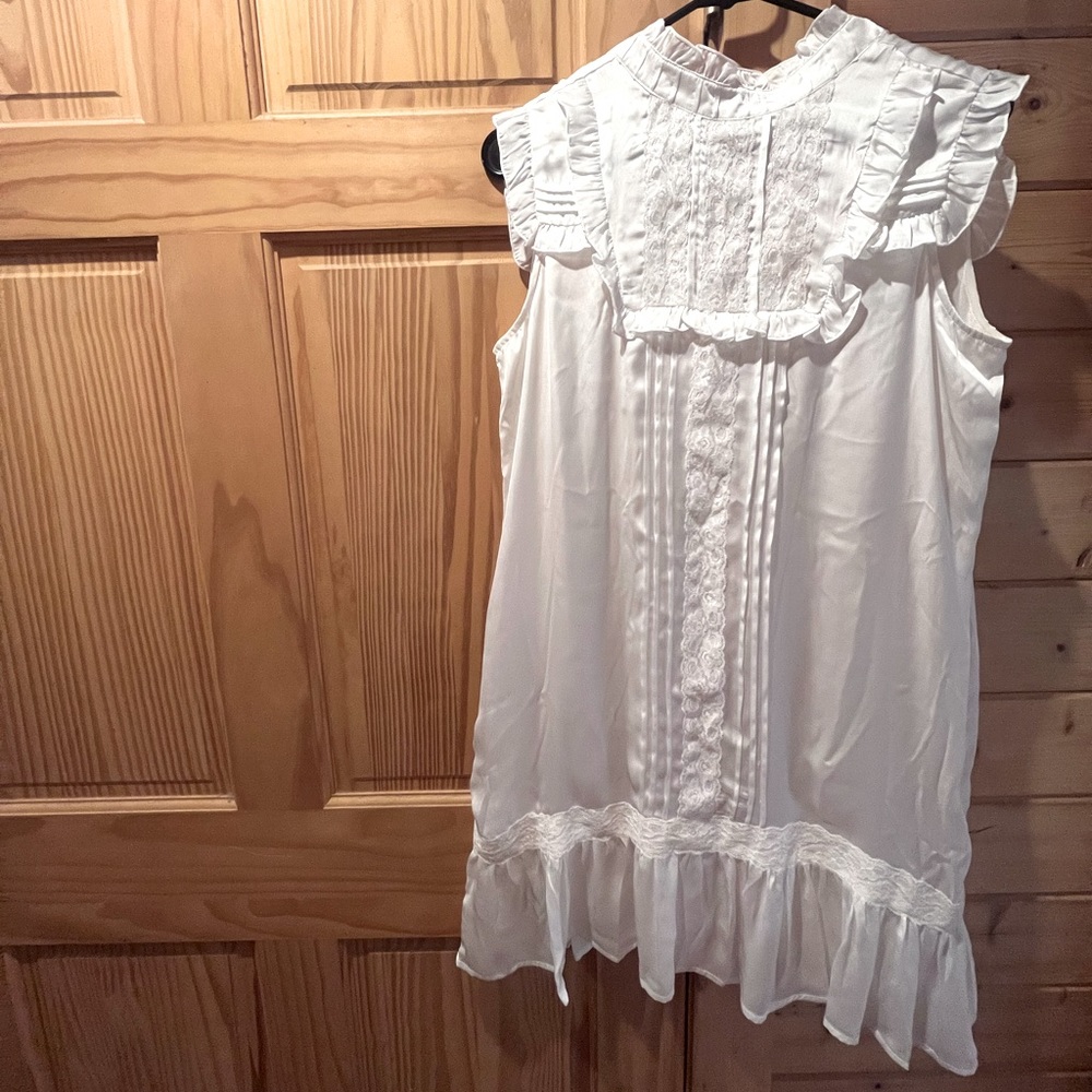 Satin-finish off white, mock turtle neck, romantic mini dress.
